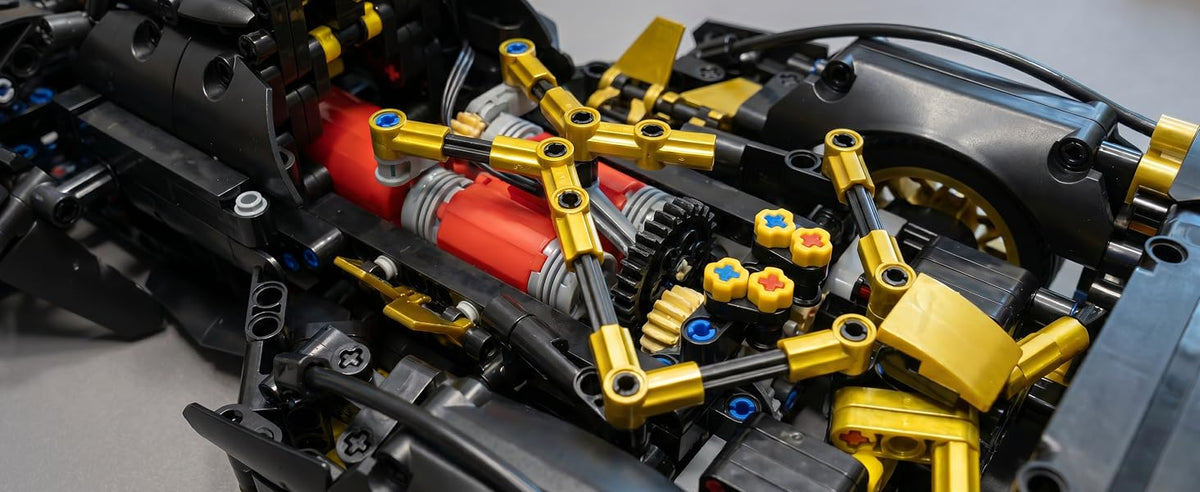 975-Piece RC Supercar Building Kit — V12 & LEDs — engine mechanism