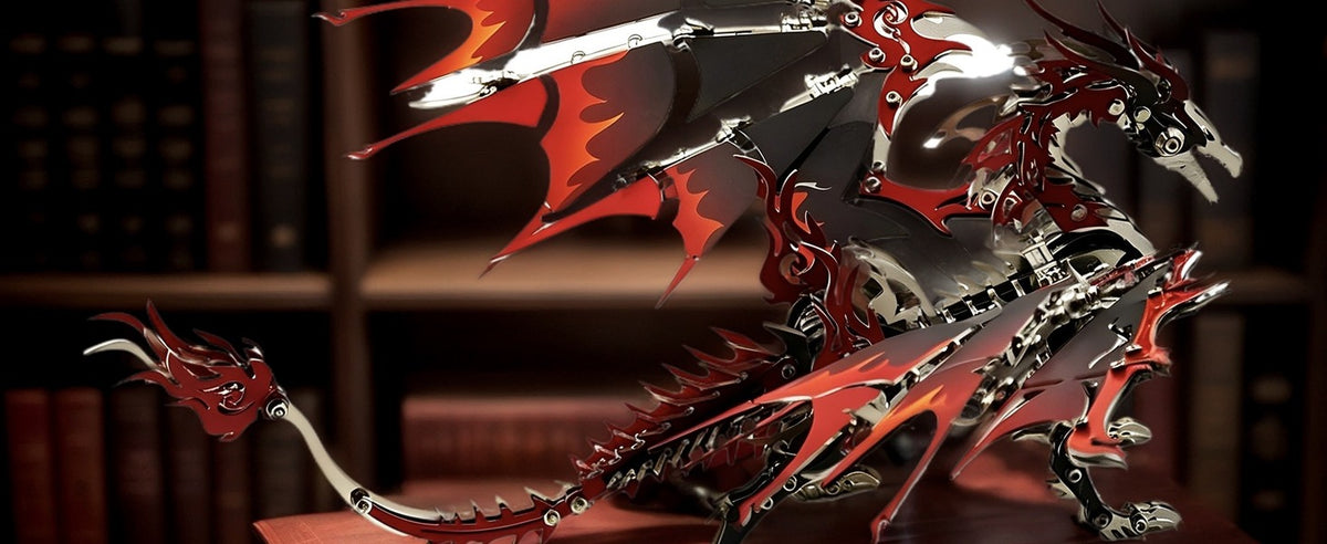 Red and silver metal dragon displayed on a shelf